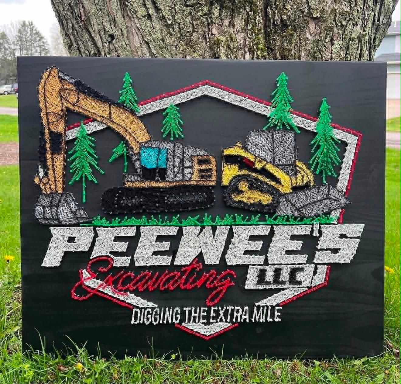 Detailed string art sign for Peewee's Excavating LLC featuring an excavator and skid steer